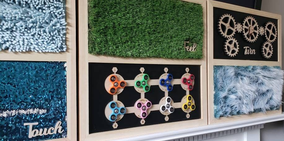 Wall-mountable Dual-play sensory boards for adults and children from Sensory Crafters.